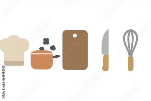 Cooking setup featuring utensils and chef hat in a minimalist kitchen environment during daylight
