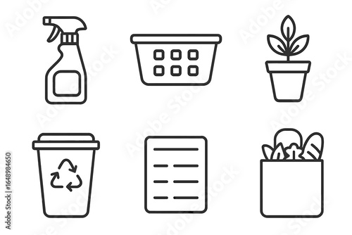 Cleaning supplies and composting items organized for an eco-friendly household project in a modern kitchen space