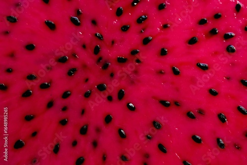 dragon fruit macro vibrant pink texture with black seeds