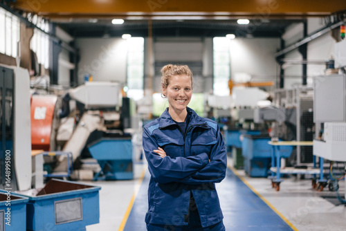 Young woman working as a skilled worker in a high tech company, portrait