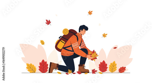 Man Exploring Nature During Autumn Season Collecting Fallen Colorful Leaves