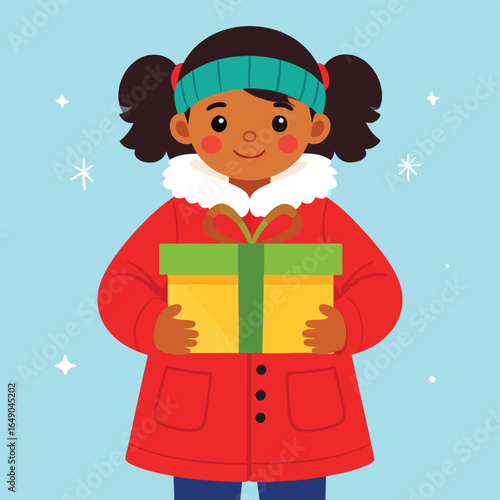 A young girl in winter attire holds a Christmas gift, smiling warmly.