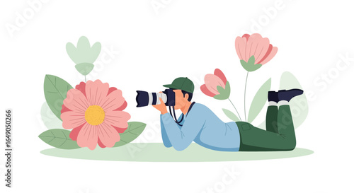 Photographer Capturing Floral Beauty Lying Down in a Garden Environment