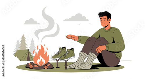 Relaxing Man Warms Himself By The Campfire On A Chilly Outdoor Adventure Trip