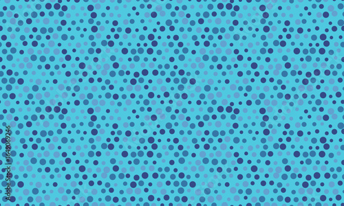 Abstract blue circle pattern.  Seamless texture of varying sized dots, ideal for backgrounds, website design, or textile prints.  Represents connection, unity, or data visualization.