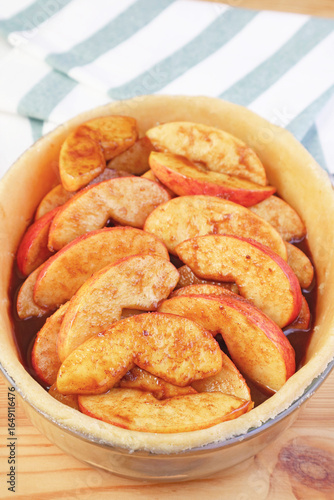 Closeup of pie plate ready for baking an apple pie
