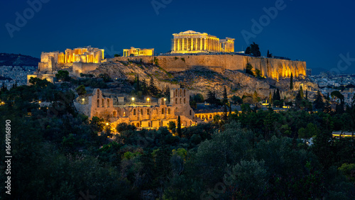 Acropolis Parthenon historical site illuminated at night in Athens, Greece