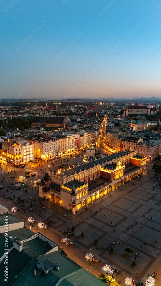 Obraz premium aerial view over central square of krakow in evening at sunset in poland