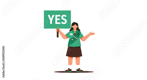 A young person in uniform holding a green sign with the word yes indicating approval and agreement