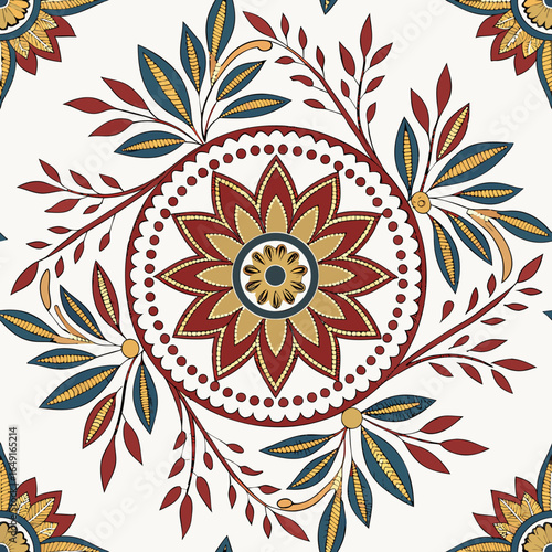 Ornate floral pattern with symmetrical arrangement of blossoms and foliage in warm color palette