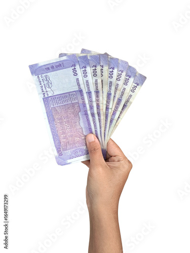 Canvas Print Hand holding multiple Indian 100 rupees currency notes in a fanned spread, isolated on a transparent background