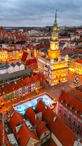 evening view of central square of poznan in winter at sunset