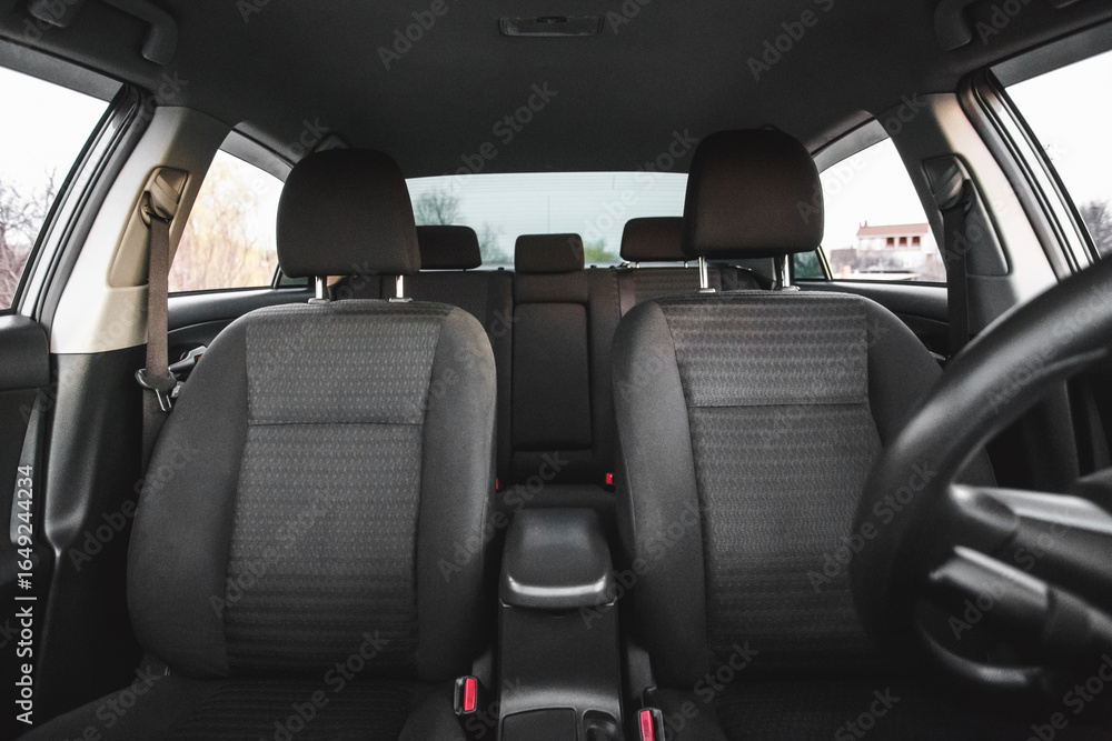Front Interior View of Modern Car with Black Fabric Seats Front Interior View of Modern Car with Black Fabric Seats