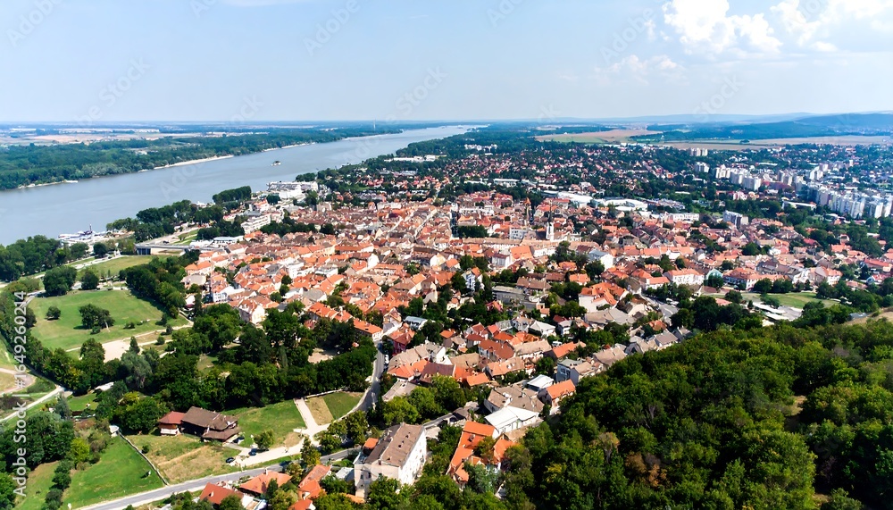 Fototapeta premium Panoramic view of a European city alongside a river