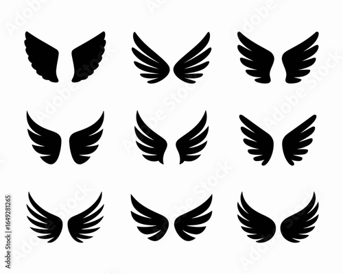 Collection of nine black wing silhouettes isolated on white background