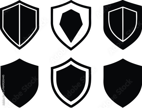 Collection of shield silhouettes and icons isolated on white background