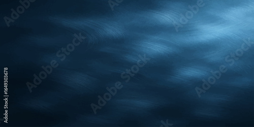 A moody cloudscape with dark, blue storm clouds gathering under a stormy sky