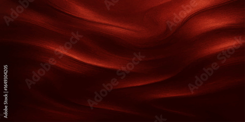 Waving red satin and silk fabric, a smooth flowing texture with a shiny, luxurious finish