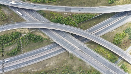 Tableau sur toile Aerial drone shot of busy motorway junction intersection with numerous bridges a