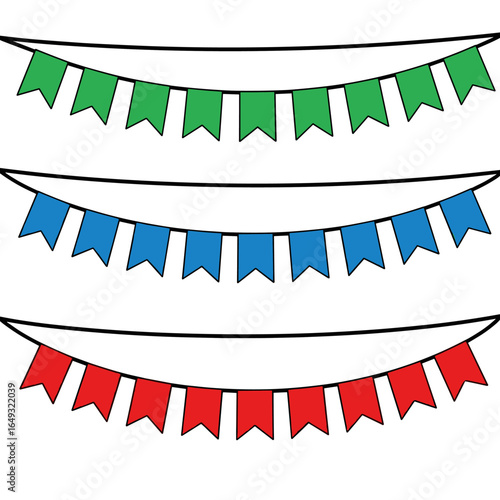 Festive bunting flags in green blue and red strung on a line for decorations