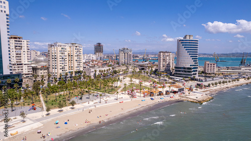 Aerial Bird's eye view of Albanian city Durres. Buildings and beach along Adriatic sea coast.
