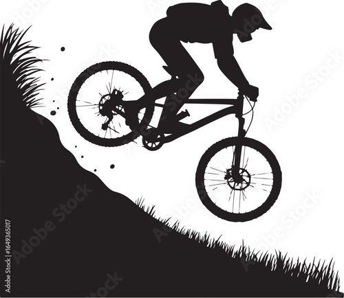Dynamic cyclist descends steep mountain trail airborne jump action