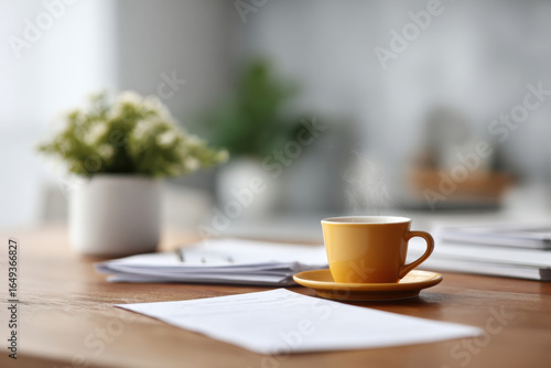 Wallpaper Mural ultrabright table setting featuring invoice with blurred white text bars minimalist books and steaming cup of Torontodigital.ca