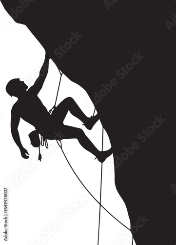 Silhouette of a rock climber ascending a steep cliff face