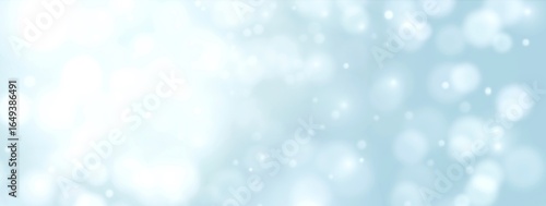 Abstract blue bokeh background - Christmas and winter concept - Blurred bokeh circles and snow flakes