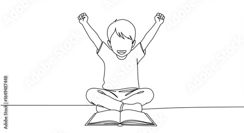 Happy child with arms raised sitting on a book, isolated on white background