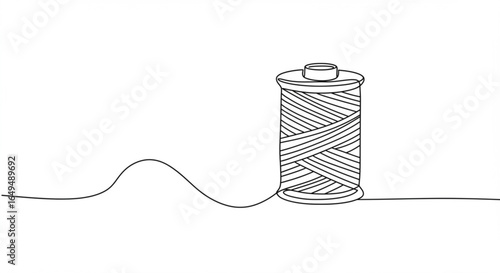 Single line drawing of a spool of thread isolated on white background