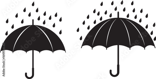 Two black umbrellas under falling raindrops silhouette