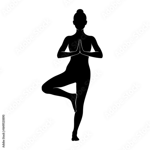 Woman in yoga tree pose silhouette