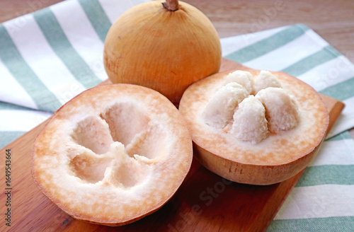 Closeup of Delectable Fresh Ripe Santol Fruit or Wild Mangosteen with a Whole Fruit