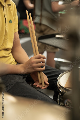 young man playing drums
