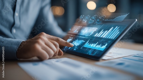 Businessman reviewing quarterly financial report with tablet and graphs AI technology concept