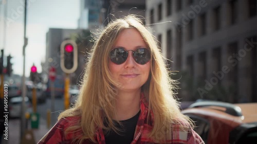 Woman in Sunglasses Walking in Business City Center