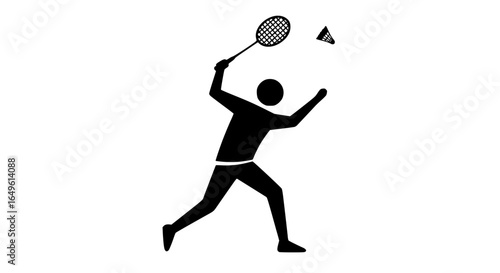 Man hitting a shuttlecock black and white