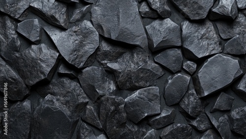 Dark gray stone fragments tightly packed