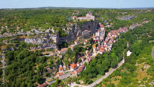Rocamadour is a vertical village built in a series of stages on the cliff above the Alzou Canyon. Lot, Occitanie region, Périgord, France. Rocamadour was primarily a major pilgrimage site.