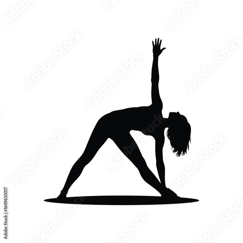 Silhouette of a woman performing a yoga triangle pose