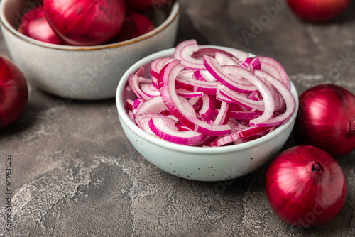 Shallot onion on the kitchen table. onion slice. onion rings. Fresh red Onion. Natural, fresh, vegetarian food. Agricultural products. Healthy eating. Vegetables. Farmer's market.