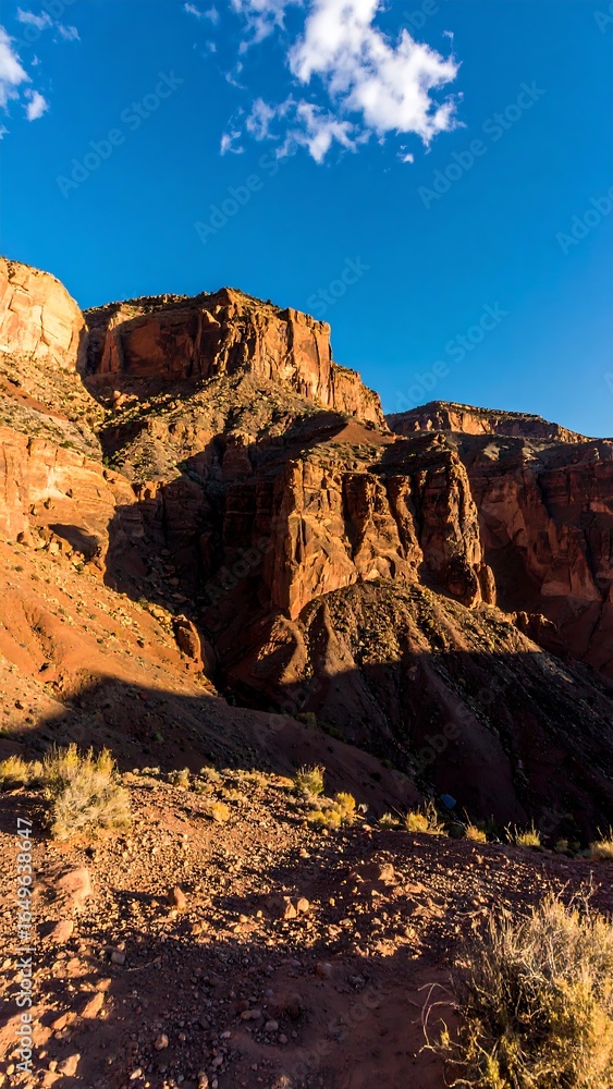 Fototapeta premium Red rock formations under a clear sky.