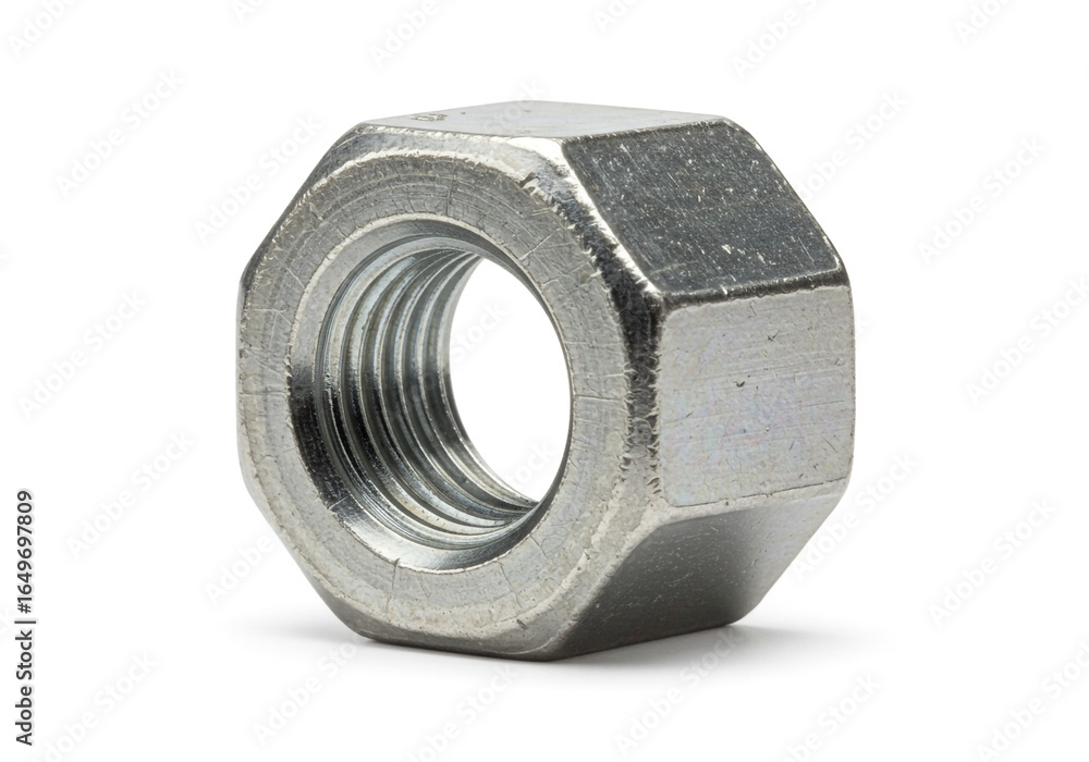 A close up shot of a single metal hex nut with visible threads on a plain white background studio shot A close up shot of a single metal hex nut with visible threads on a plain white background studio shot