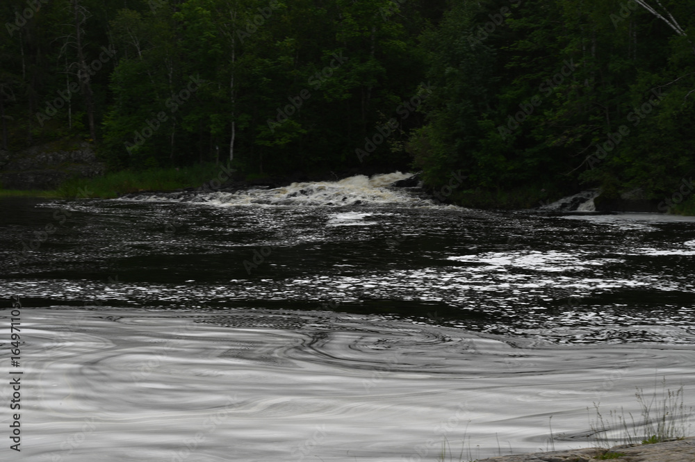 Fototapeta premium water flowing into the river