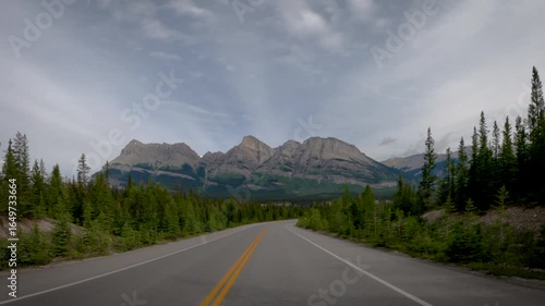 Mountain Road Leading to Rocky Peaks in the Canadian Rockies