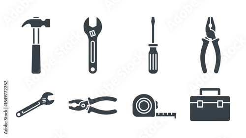 Toolbox Assembly: A meticulously curated collection of essential hand tools arranged in a comprehensive layout. Highlighting each tool's function for any repair.