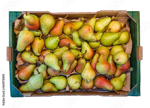 Foto Pears Carmen in a cardboard box top view, isolated
