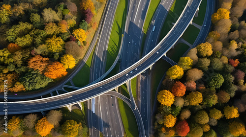 Aerial view directly above a major UK motorway junction with Autumn colours