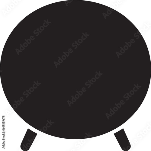 A simple black circle resting on two short legs in a minimalist design against a white background space